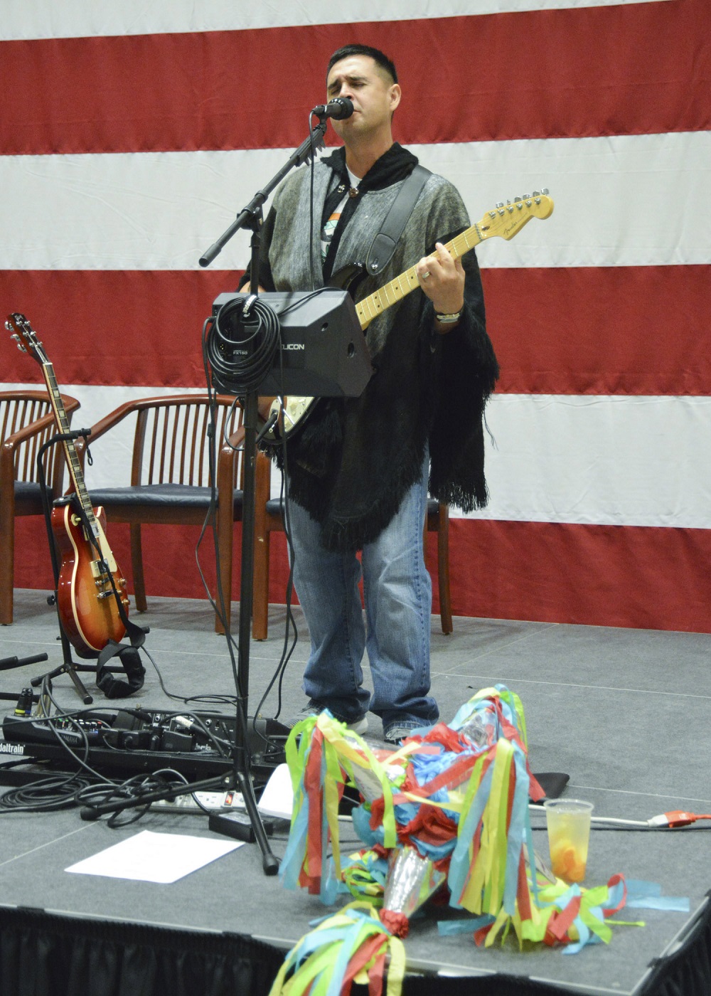 The celebration included a guest performance by Chief Jose Marcelo, who entertained the crowd of Sailors and civilians with traditional Hispanic music.  U.S. Navy photo by Robert Fluegel/Released 

