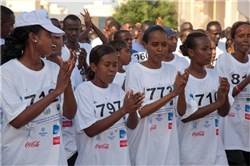 DJIBOUTI, Djibouti (March 2, 2012) - Runners clap along to music played by Djibouti's Musique Nationale band before the 16th Annual Djibouti International Semi-Marathon here March 2. More than 40 U.S. service members and civilians from Camp Lemonnier, Djibouti, ran alongside 800 other international runners during the event.  (U.S. Air Force photo by Technical Sergeant Ryan Labadens)