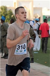 DJIBOUTI, Djibouti (March 2, 2012) - U.S. Air Force Captain Peter Euler, Combined Joint Task Force - Horn of Africa air operations planner, crosses the finish line at the 16th Annual Djibouti International Semi-Marathon here March 2. Euler was the first American to complete the race, with a time of 1 hour, 33 minutes and 20 seconds. More than 40 U.S. service members and civilians from Camp Lemonnier, Djibouti, ran alongside 800 other international runners during the event.  (U.S. Air Force photo by Technical Sergeant Ryan Labadens)