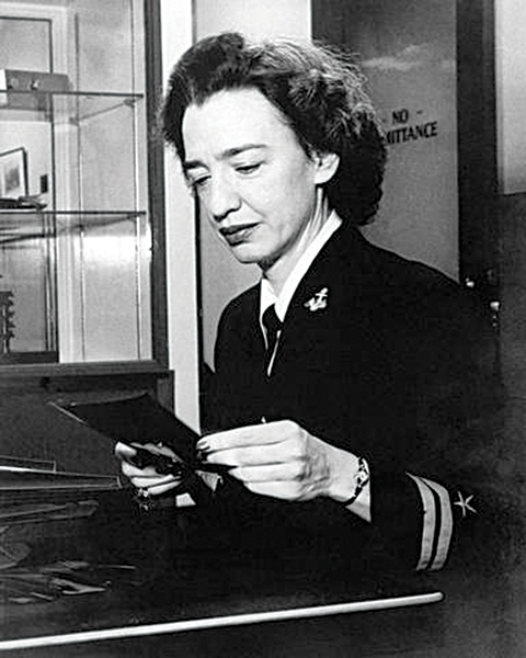 Lt. j.g. Grace Brewster Hopper working at the Bureau of Ordnance Computation Project, Harvard University, Cambridge, Mass., January 1946. Photo courtesy of the Defense Visual Information Center.