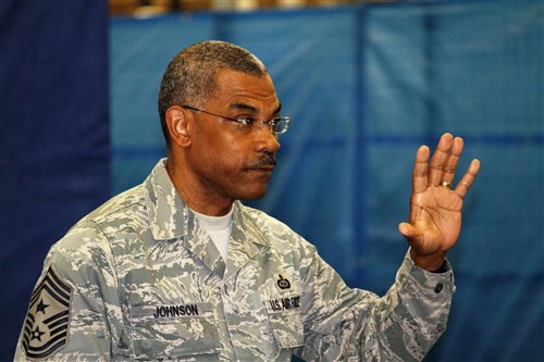 RAF Molesworth, United Kingdom -  Chief Master Sergeant Jack Johnson Jr. shares his goals of his new position with the enlisted force of the Intelligence and Knowledge Development Directorate-Molesworth at an all-hands call at Royal Air Force Molesworth on April 28, 2011.  (Photo by Melony Angelilli)