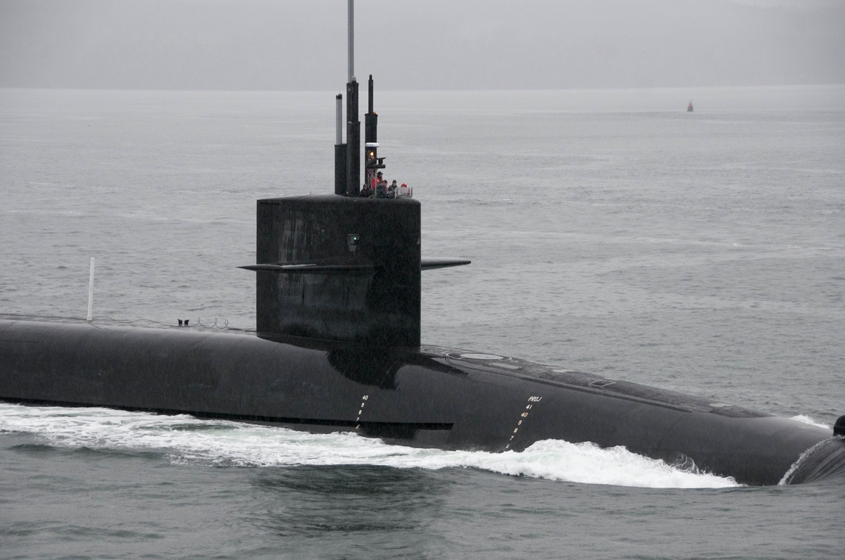 PUGET SOUND, Wash. (March 13, 2016) The Ohio-class ballistic-missile submarine USS Kentucky (SSBN 737) departs Naval Base Kitsap-Bangor for the boat's first strategic deterrent patrol since 2011. The boat recently completed a 40-month Engineered Refueling Overhaul, which will extend the life of the submarine for another 20 years. U.S. Navy photo by Mass Communication Specialist 2nd Class Amanda R. Gray 