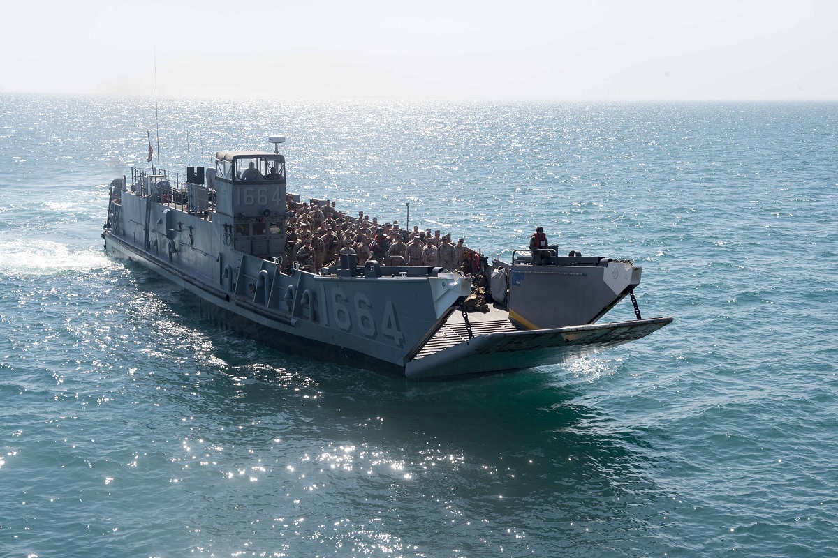 ARABIAN GULF (March 1, 2016) A landing craft unit (LCU) approaches the stern of the amphibious transport dock ship USS Arlington (LPD 24). The U.S. Navy, U.S. Marine Corps and Kuwait Armed Forces are conducting Amphibious Landing Exercise (PHIBLEX 16), a bilateral amphibious and ground exercise, to enhance operational readiness and improve interoperability between U.S. and regional partners. Arlington is part of the Kearsarge Amphibious Ready Group (ARG) and, with the embarked 26th Marine Expeditionary Unit (MEU), is deployed in support of maritime security operations and theater security cooperation efforts in the U.S. 5th Fleet area of operations. U.S. Navy photo by Mass Communication Specialist 3rd Class Kaleb R. Staples