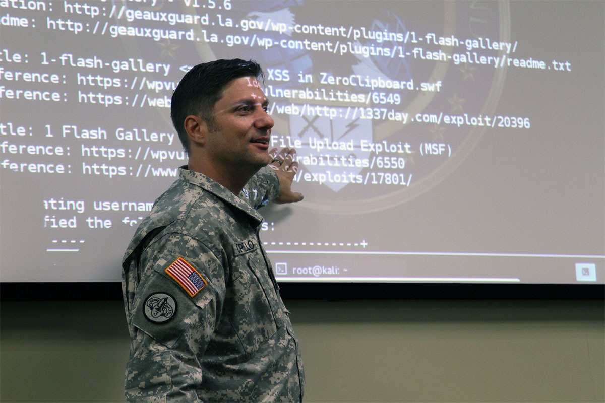Louisiana Army National Guard Lt. Col. Henry T. Capello, chief communications plans officer, trains members of the Cyber Defense Incident Response Team to defend the state’s cyber assets at Louisiana State University’s Stephenson Disaster Management Institute in Baton Rouge, Nov. 15, 2015. The team was created to respond to cyber events within Louisiana by securing and restoring affected networks and defeating threats. It is made up of soldiers and airmen who have technology backgrounds in both their civilian and military careers. Louisiana Army National Guard photo by Spc. Garrett L. Dipuma