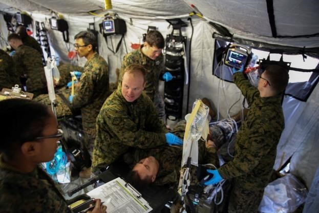 CAMP LEJEUNE, N.C. (Jan. 28, 2016) Corpsmen with 2nd Medical Battalion treat notional injuries as part of training exercise in preparation for their upcoming multinational exercise, Cold Response 16.1, in Norway at Camp Lejeune, N.C. The corpsmen were evaluated after every scenario in order to better understand what they did for each patient, and why they did it.  U.S. Marine Corps photo by Cpl. Michael Dye 