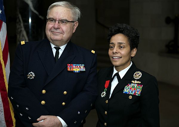 ANNAPOLIS, Md. (Dec. 10, 2015) French Chief of Staff Adm. Bernard Rogel stands by Vice Chief of Naval Operations Adm. Michelle Howard after presenting her with the Legion d'Honneur Award at the Crypt of John Paul Jones in the main chapel of the U.S. Naval Academy in Annapolis, Md., Dec. 10. The Legion d'Honneur Award is France's highest award. U.S. Navy Photo by Mass Communication Specialist 2nd Class Tyrell K. Morris.