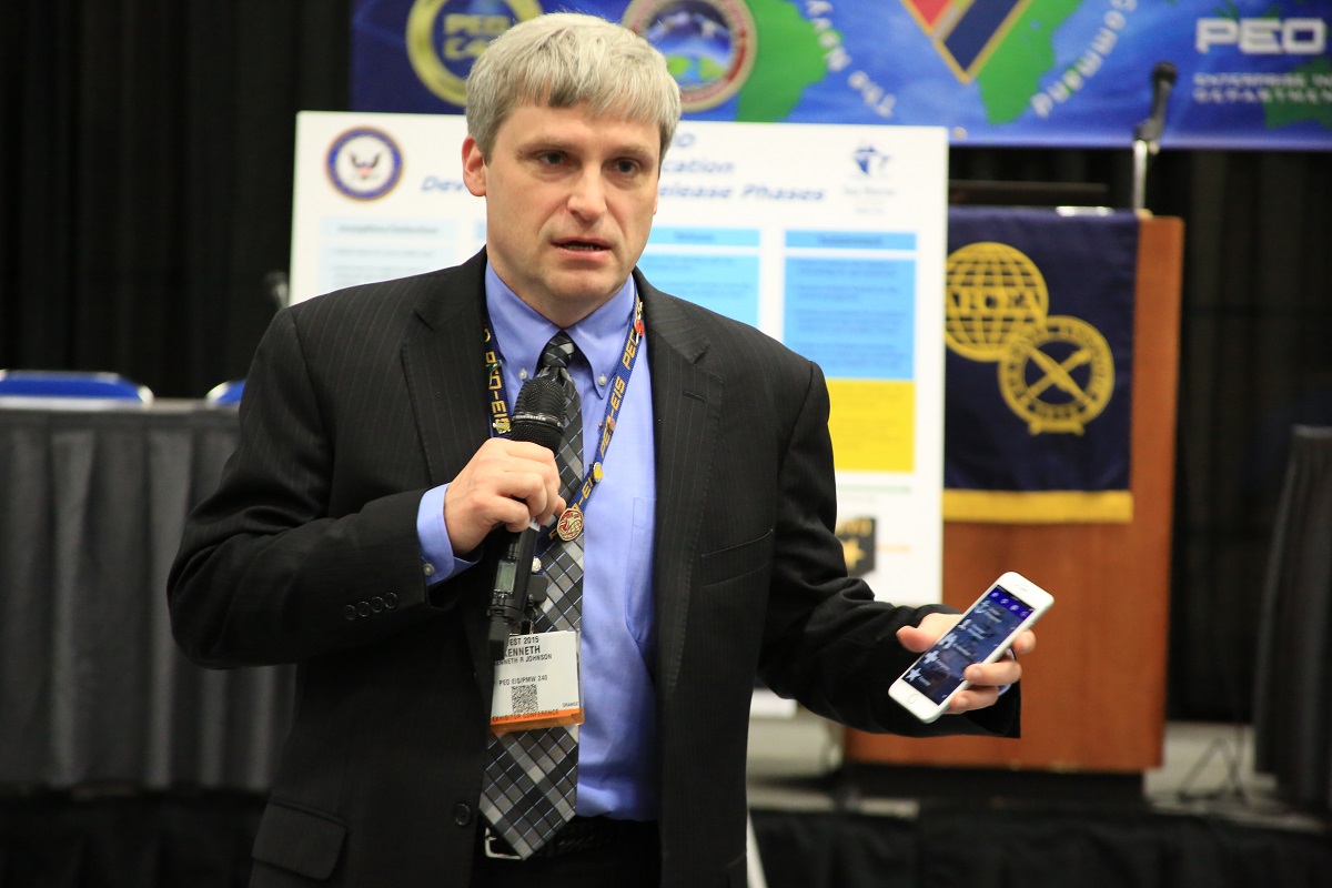 Ken Johnson, the Sea Warrior Program (PEO EIS, PMW 240) and Manpower, Personnel, Training, and Education (MPT&E) Technical Director, demonstrating the eDivo at AFCEA West in February. Photo by Krishna Johnson.