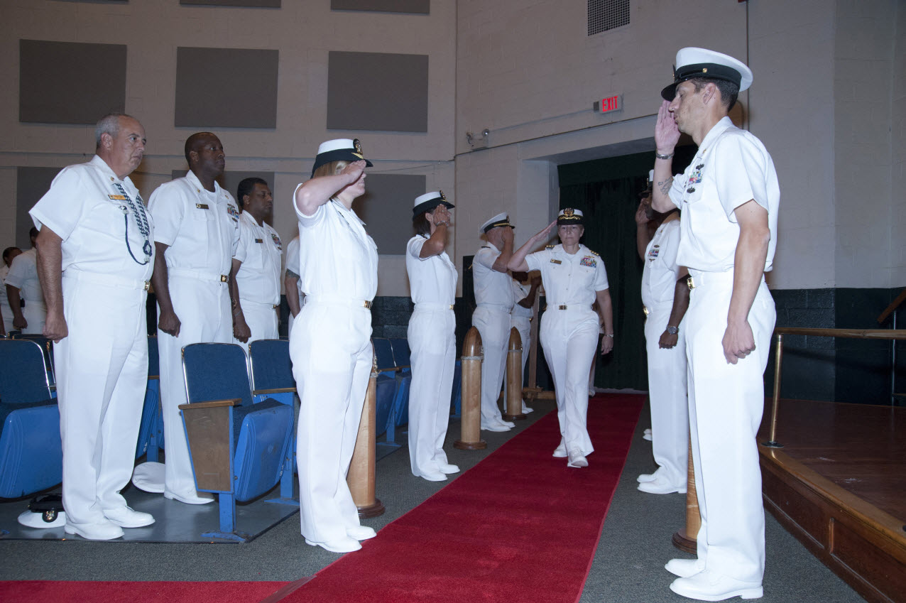 NORFOLK, Va., (Sept. 4, 2014) Capt. Kelly Aeschbach, passes through the Side Boys as Commanding Officer, Naval Computer and Telecommunication Area Master Station Atlantic, upon the conclusion of her change of command ceremony. U.S. Navy photo by Mass Communication Specialist 1st Class Elizabeth L. Burke. 
