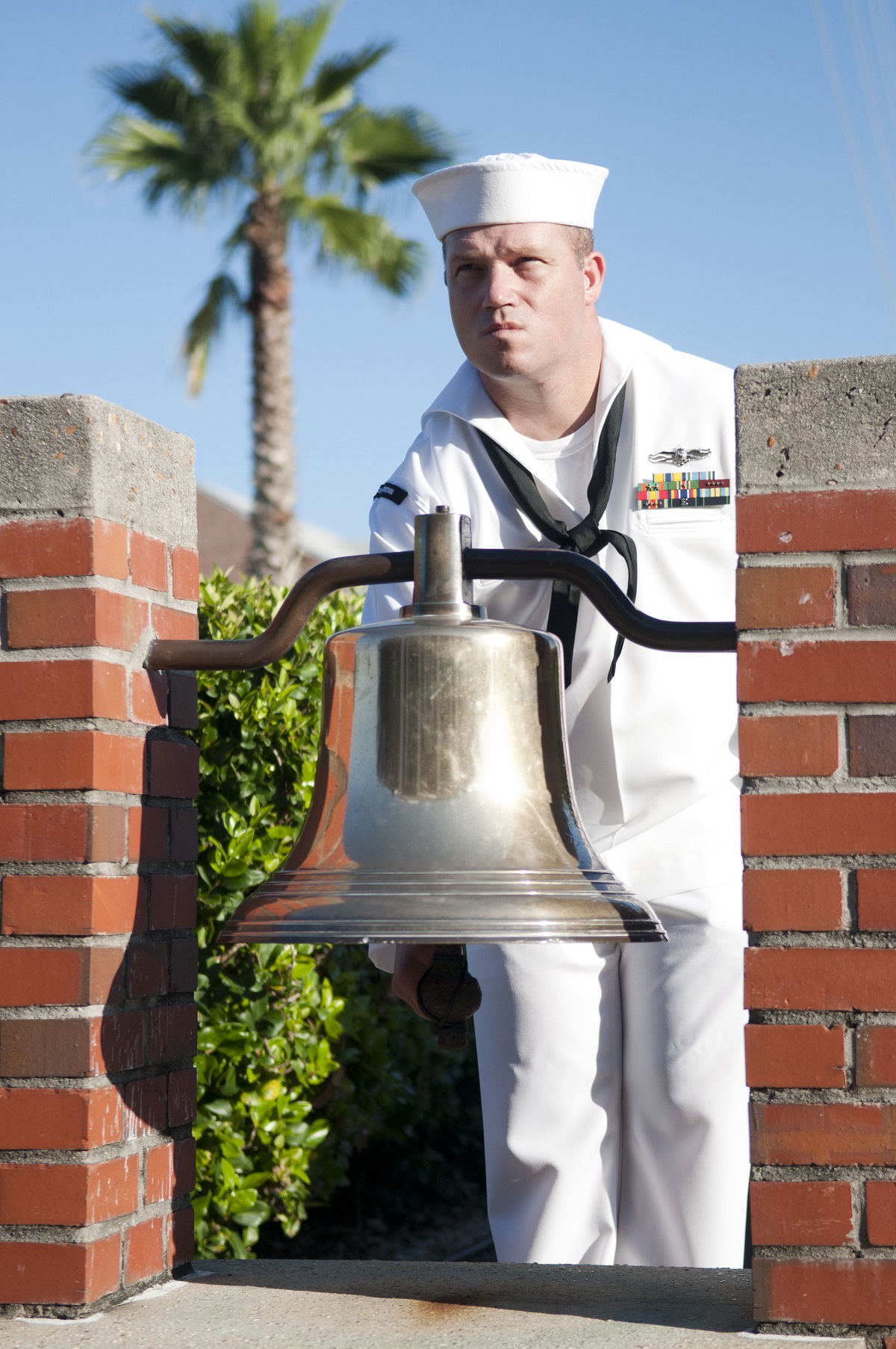 PENSACOLA, Fla. (Sept. 9, 2016) Chief (select) Cryptologic Technician (Collection) Lance Burney strikes a bell during a Sept. 11 remembrance ceremony at Naval Air Station Pensacola's Corry Station. U.S. Navy photo by Mass Communication Specialist 3rd Class Taylor L. Jackson/Released 