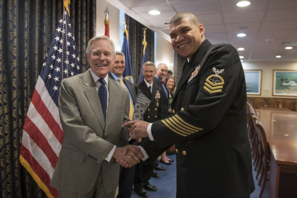 WASHINGTON (April 21, 2016) Secretary of the Navy (SECNAV) Ray Mabus presents Chief Sonar Technician (Surface) Benjamin Lebron from USS Fitzgerald (DDG 62) with the 2015 SECNAV Innovation Award for the Enlisted Innovator category during a ceremony at the Pentagon. U.S. Navy photo by Mass Communication Specialist 2nd Class Armando Gonzales 
