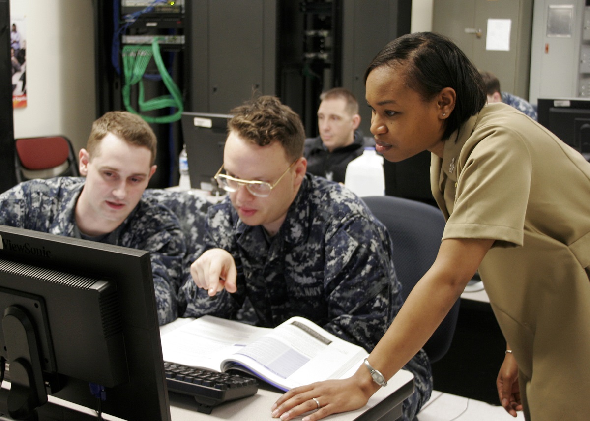 Information Systems Technician (IT) 1st Class (IDW/EXW) Shanta McPherson, a native of Elizabeth City, North Carolina, teaches students at Information Warfare Training Command (IWTC) Virginia Beach. She is an IT "C" and "F" school instructor and course supervisor and became master training specialist certified in 2015. U.S. Navy photo by Information Systems Technician 1st Class Anabel Delgado-Gionet/Released 

