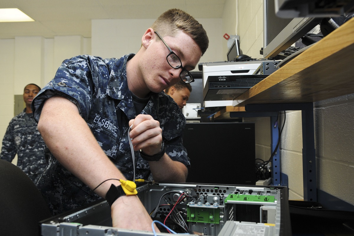 PENSACOLA, Fla. (July 26, 2016) Seaman Jacob Elsbree, an information systems technician student, practices basic computer hardware configuration at Information Warfare Training Command Corry Station aboard Naval Air Station Pensacola's Corry Station.  U.S. Navy photo by Mass Communication Specialist 3rd Class Taylor L. Jackson 