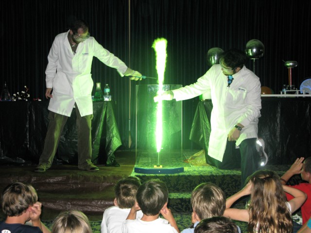  Navy physicist Dan Flisek and engineer Bill Porter perform their "Walk the Dog" demonstration for elementary school children as part of Naval Surface Warfare Center Panama City Division's Science, Technology, Engineering and Math (STEM) Outreach. U.S. Navy photo by Dan Broadstreet/Released.