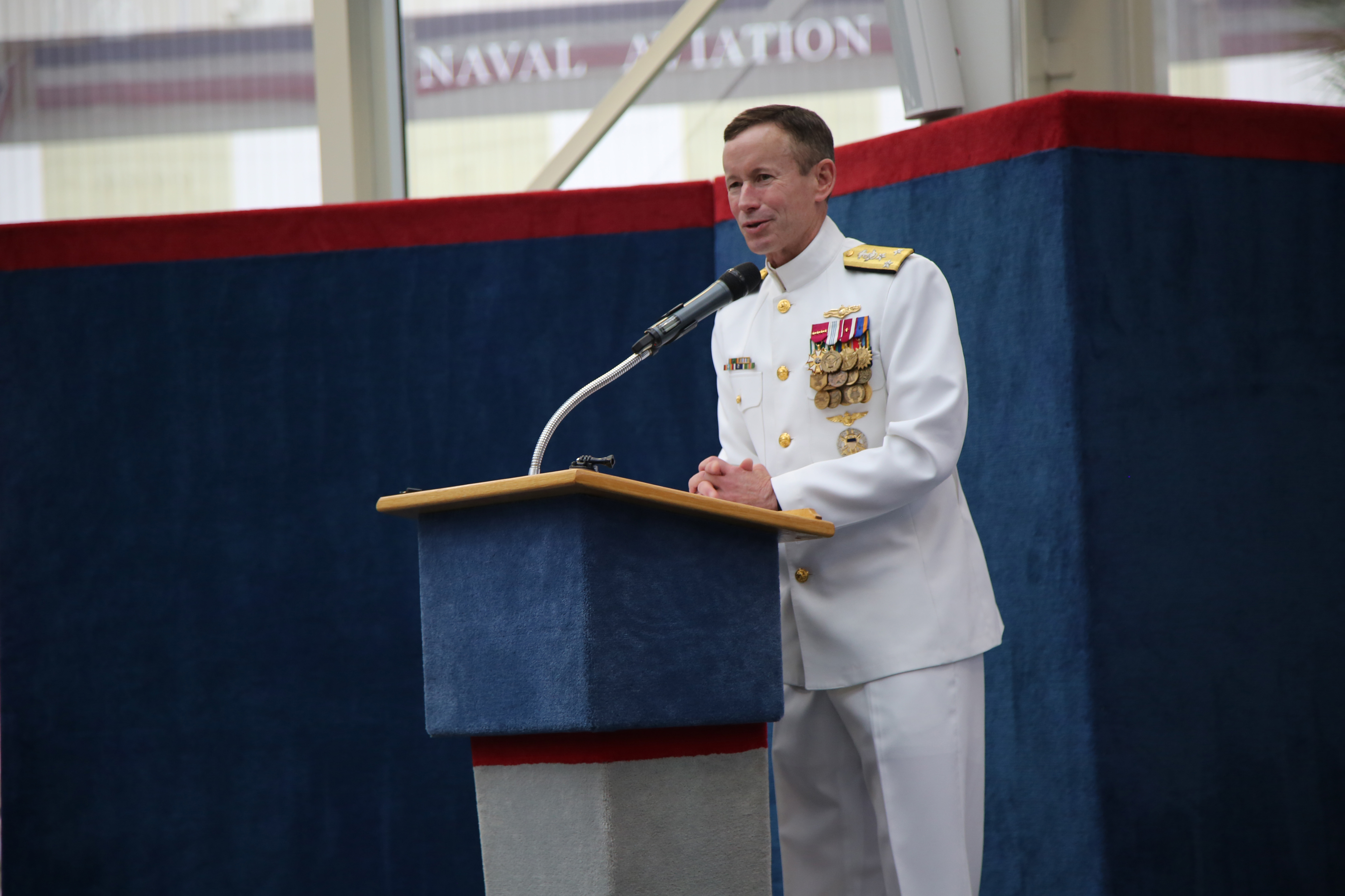 PENSACOLA, Fla. (May 3, 2016) Deputy Chief of Naval Operations for Information Warfare and Director of Naval Intelligence Vice Adm.Ted Branch addresses the audience at the Center for Information Dominance (CID) change of command ceremony. During the event, held at the National Museum of Naval Aviation, Capt. Maureen Fox turned command over to Capt. William Lintz. U.S. Navy photo by Joy Samsel.