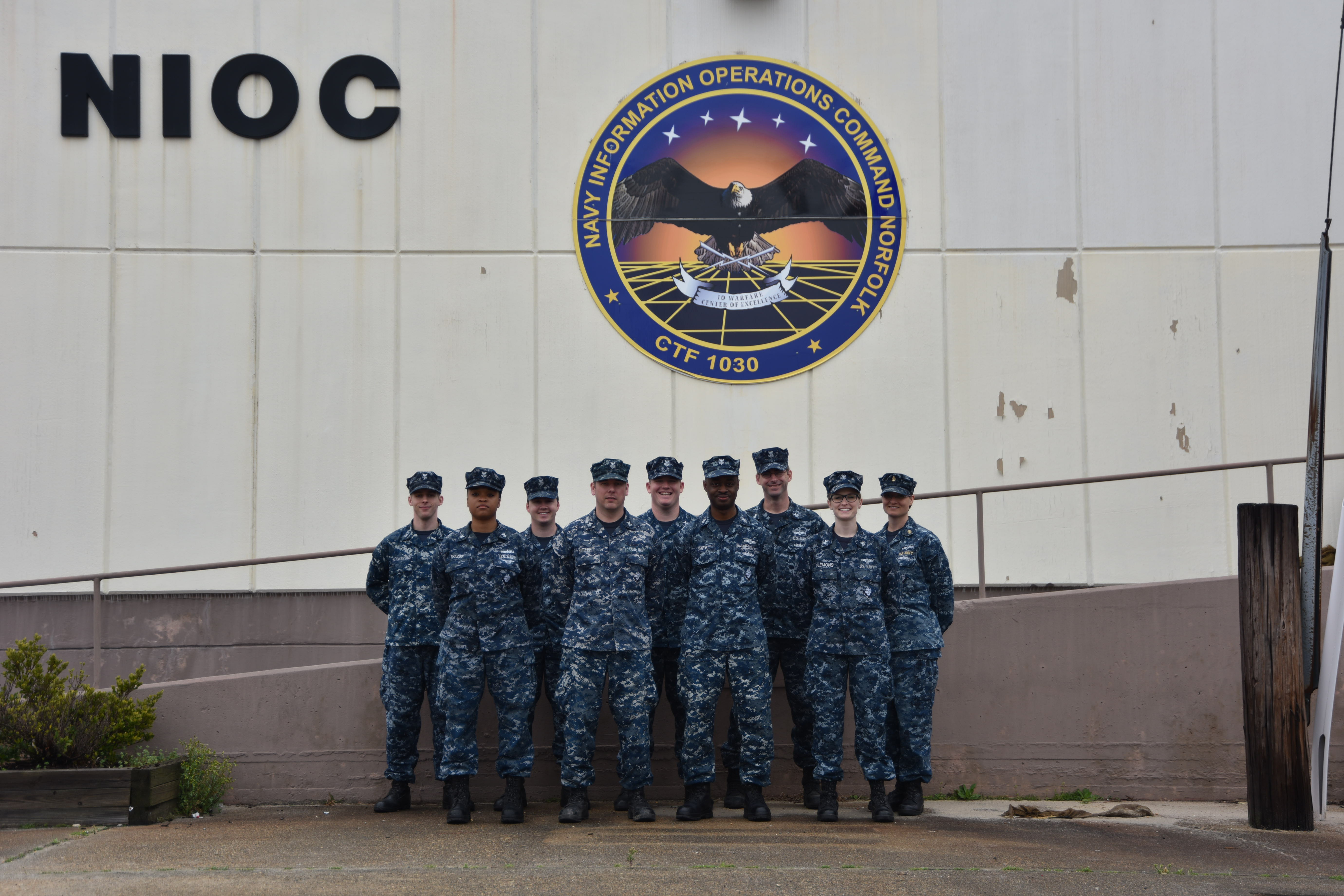 (Left to Right) CNTT Instructors; IT2 Nicholas Blankenship, IT2 Kiara Frazier, IT1 Jacob Barteaux, CTN1 Matthew Ritzert, CTN1 Charles Holland, IT1 Kirk Smith, IT1 Brian Foley, IT2 Erin Plemons and ITC Michelle Hunter. Photo courtesy of U.S. Navy by IT2 (IDW) Deveion R. Acker.