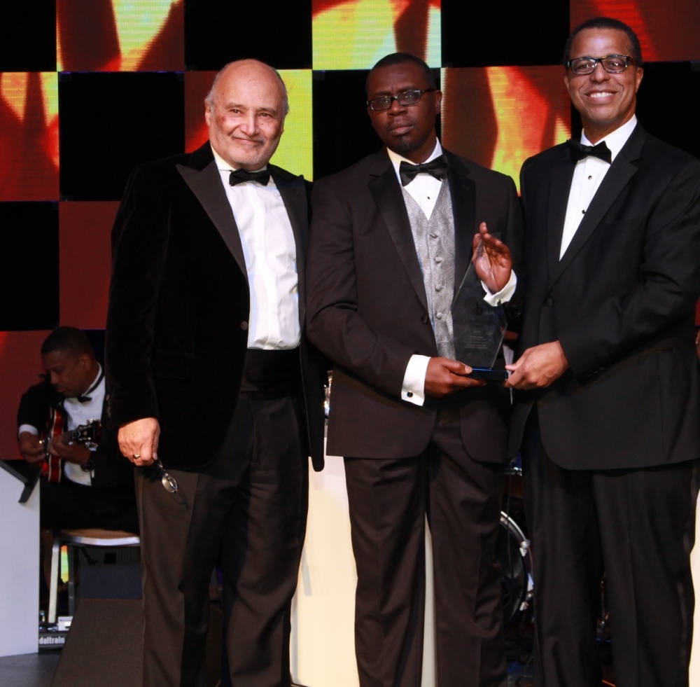 Ernest Yelder - a Naval Surface Warfare Center Dahlgren Division cybersecurity expert based at Combat Direction Systems Activity (CDSA) Dam Neck - accepts his 2016 Black Engineer of the Year Award from Dr. Ken Washington, Ford Motor Company Vice President of Research and Advanced Engineering, during the 30th annual Black Engineer of the Year Awards (BEYA) Gala in Philadelphia, Feb. 20. The three-day BEYA conference recognized the significant accomplishments of African-Americans in government and industry, who have achieved exceptional career gains in the fields of science, technology, engineering and mathematics. U.S. Navy photo 

