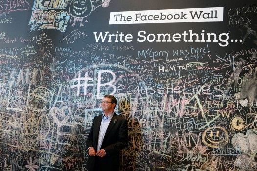 Defense Secretary Ash Carter stands in front of the Facebook wall during his visit to the company’s headquarters in Menlo Park, Calif., April 23, 2015. Carter is on a two-day trip to Silicon Valley. Before visiting the company, Carter delivered a lecture at Stanford University, where he unveiled the Defense Department’s new cyber strategy. DoD photo by U.S. Army Sgt. 1st Class Clydell Kinchen
