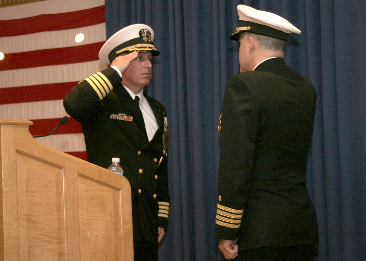 VIRGINIA BEACH, Va. (Dec. 1, 2015) Capt. Mark C. Kester relieves Capt. Harold E. Williams as commanding officer for Center for Information Dominance (CID) Unit Hampton Roads.  During his tour, Williams led a complex merger involving the integration of the Navy and Marine Corps Intelligence Training Center and the CID Learning Sites Norfolk and Dam Neck into one cohesive command, CID Unit Hampton Roads. U.S. Navy photo by Intelligence Specialist 1st Class Jason Lee Lagoe