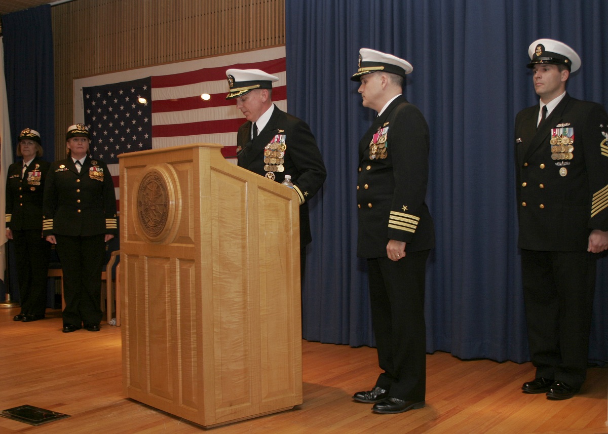 VIRGINIA BEACH, Va. (Dec. 1, 2015) Capt. Mark C. Kester reads his orders during a change of command ceremony at Center for Information Dominance (CID) Unit Hampton Roads. Kester assumed command from Capt. Harold E. Williams, who led a complex merger involving the integration of the Navy and Marine Corps Intelligence Training Center and the CID Learning Sites Norfolk and Dam Neck into one cohesive command, CID Unit Hampton Roads. U.S. Navy photo by Intelligence Specialist 1st Class Jason Lee Lagoe