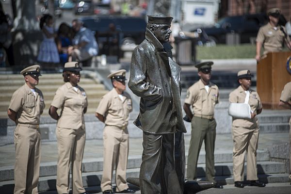 WASHINGTON (Sept. 16, 2015) The Lone Sailor statue watches over the Navy Memorial during the during the Naval District Washington pinning ceremony for its newest chief petty officers. U.S. Navy photo by Mass Communication Specialist 2nd Class George M. Bell.