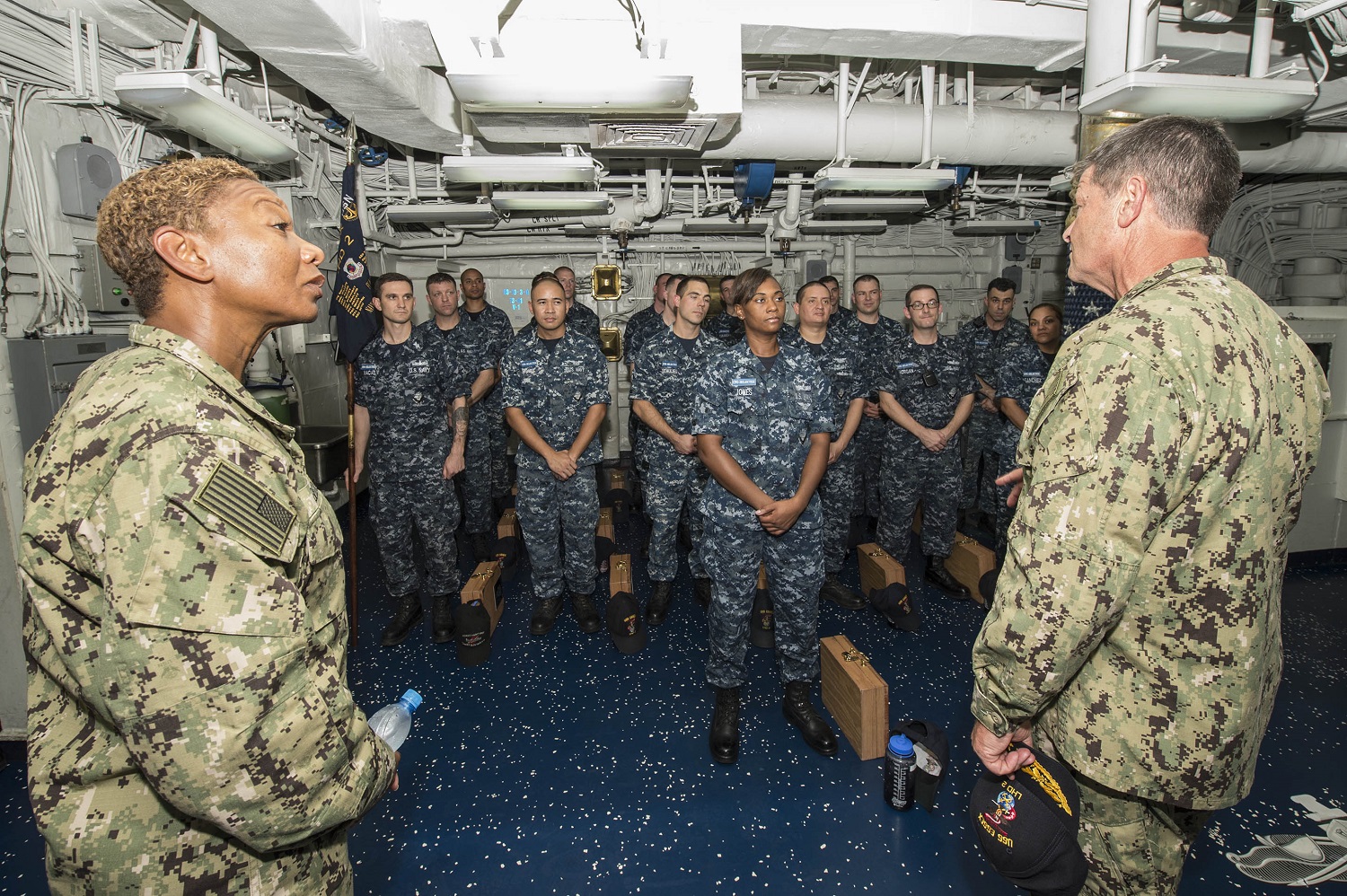 MANAMA, Bahrain (Sept. 9, 2015) Fleet Master Chief April Beldo, left, and Vice Adm. Bill Moran, Chief of Naval Personnel, speak to chief petty officer selectees onboard Wasp-class amphibious assault ship USS Essex (LHD 2) during an in port visit. Essex is the flagship of the Essex Amphibious Ready Group (ARG) and, with the embarked 15th Marine Expeditionary Unit (MEU), is deployed in support of maritime security operations and theater security cooperation efforts in the U.S. 5th Fleet area of operations. U.S. Navy photo by Mass Communication Specialist 2nd Class Huey D. Younger Jr.