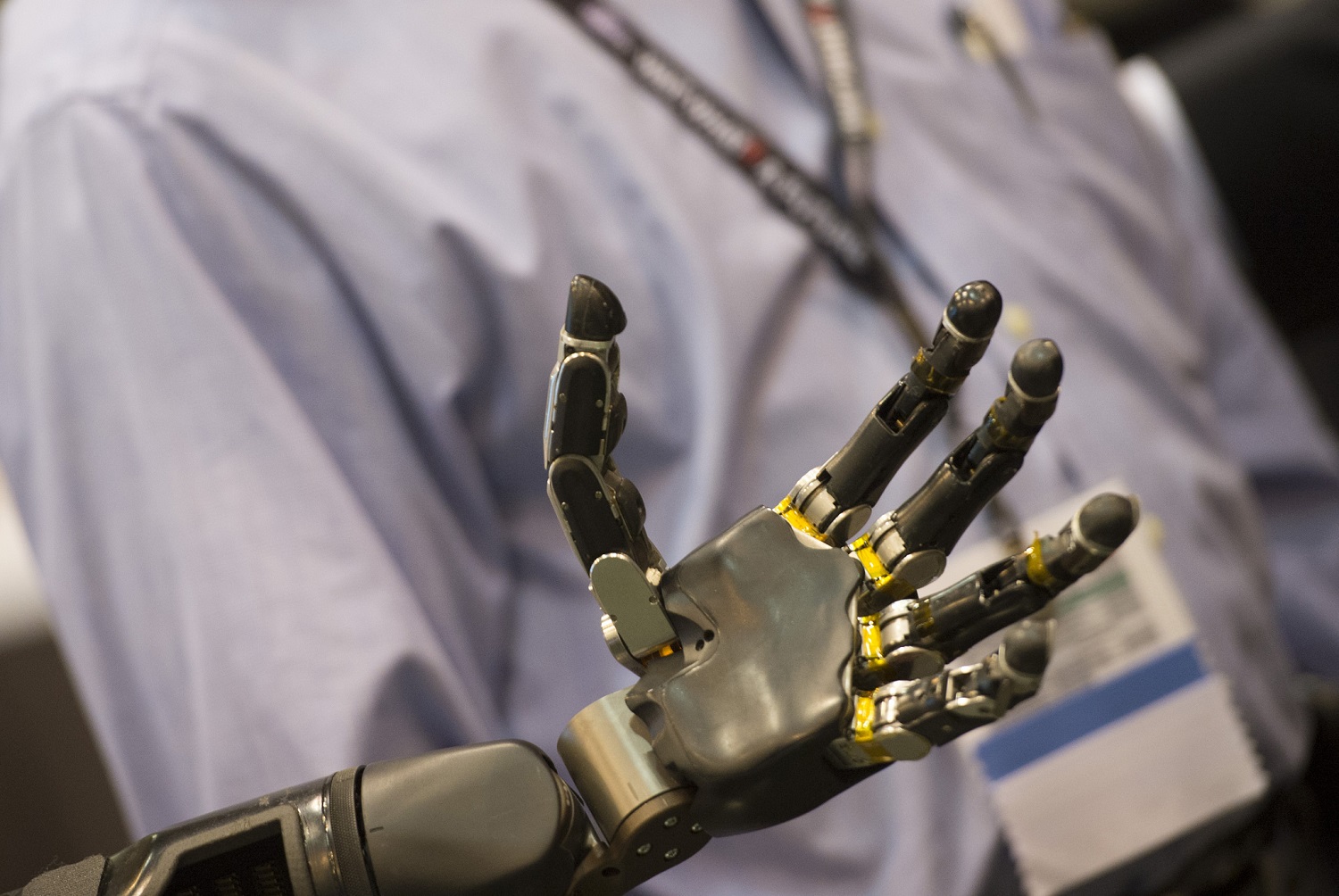 Defense Advanced Research Projects Agency scientists brief Defense Secretary Ash Carter [not pictured] on the robotic limb exhibit at the “Wait, What?" future technology forum at the America's Convention Center Complex in St. Louis, Sept. 9, 2015. DoD photo by Air Force Senior Master Sgt. Adrian Cadiz