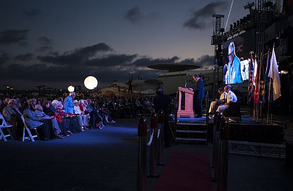 SAN DIEGO (June 6, 2015) Retired U.S. Navy Capt. Francis Knight stands as he is recognized for his involvement in the Battle of Midway during the Battle of Midway Commemoration Ceremony aboard the USS Midway Museum. U.S. Navy photo by Mass Communication Specialist 2nd Class Stephanie Smith.