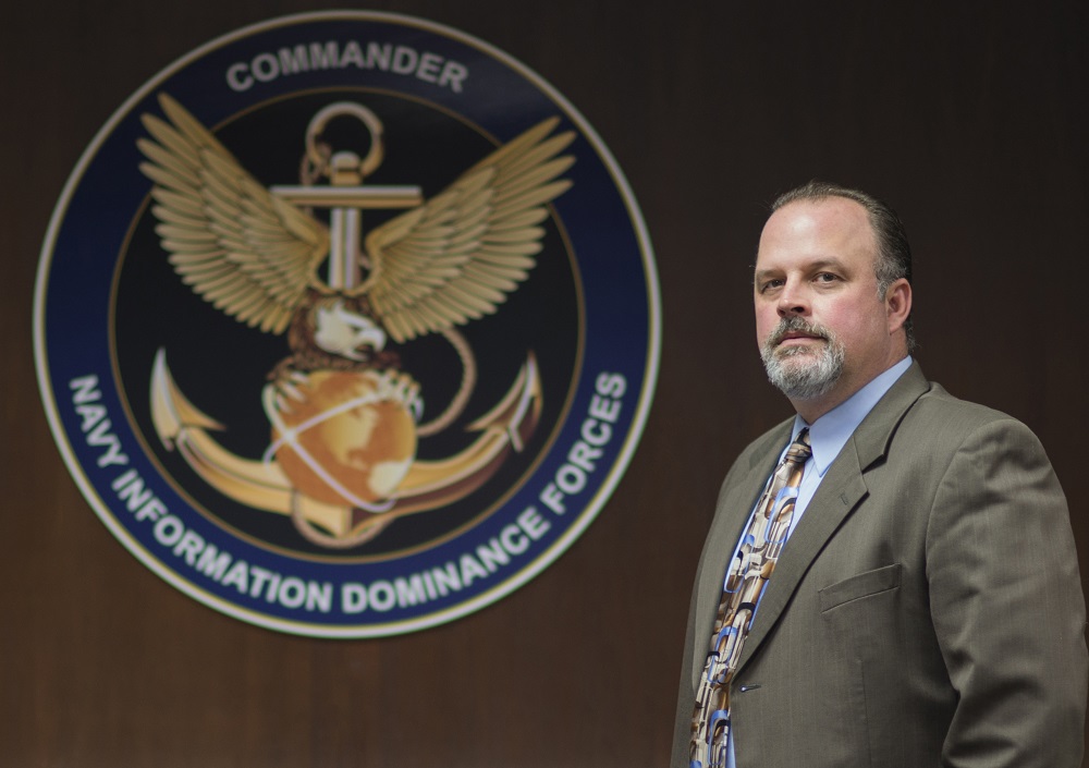 SUFFOLK, Va. (April 15, 2015) Eric Markland, command information officer and director for ashore modernization and integration at Navy Information Dominance Forces, has been selected as a 2015 Federal 100 award recipient by Federal Computer Week, a leading publication in federal information technology.  U.S. Navy photo by Information Systems Technician 1st Class Lisa Stokes.