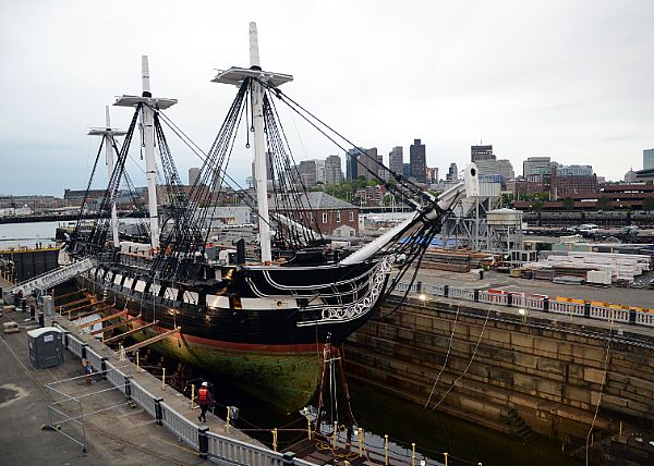 CHARLESTOWN, Mass. (May 19, 2015) The entire hull of USS Constitution is exposed for the first time in 19 years as Dry Dock 1 in Charlestown Navy Yard is dewatered. Constitution entered the dock last night to commence a multi-year planned restoration period. U.S. Navy photo by Mass Communication Specialist 2nd Class Peter Melkus.