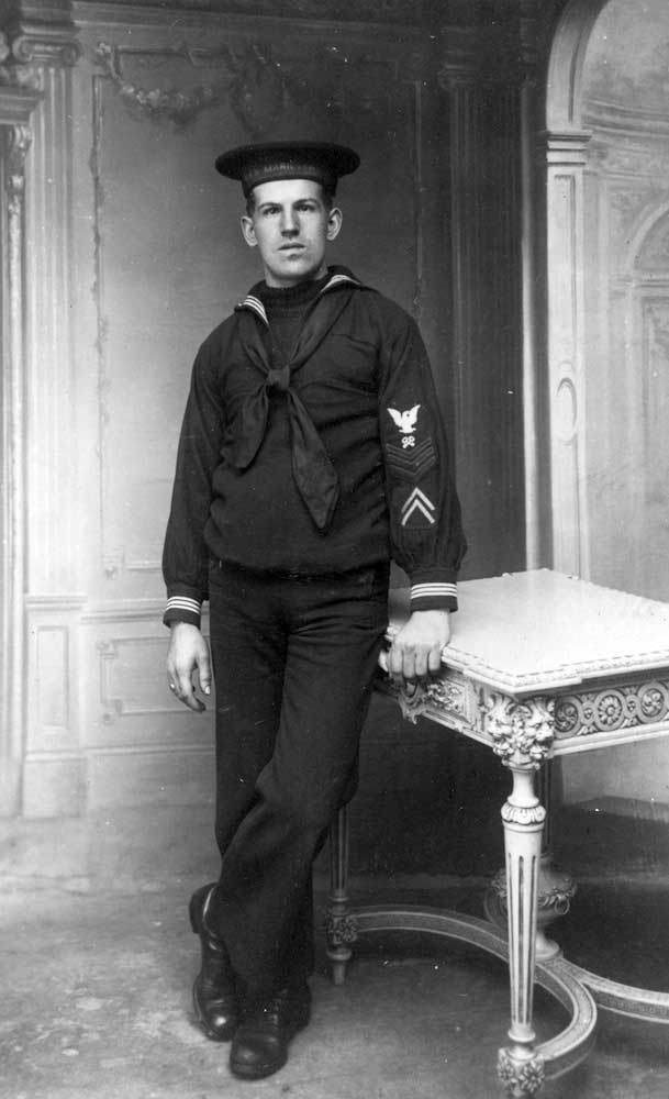 1919. Storekeeper First Class Petty Officer wearing a World War I era dress blue uniform. U.S. Navy photo.