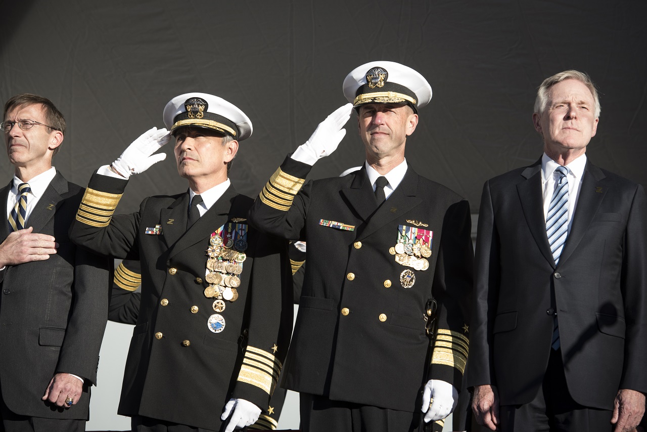 (Oct. 16, 2016) (Left to right) Assistant Secretary of the Navy (Research, Development and Acquisition) Sean Stackley, Commander, U.S. Pacific Command(PACOM) Adm. Harry Harris, Chief of Naval Operations (CNO) Adm. John Richardson and Secretary of the Navy (SECNAV) Ray Mabus render honors for the national anthem during the commissioning ceremony for the Navy's newest and most technologically advanced warship, USS Zumwalt (DDG 1000).  U.S. Navy photo by Petty Officer 1st Class Nathan Laird/Released 