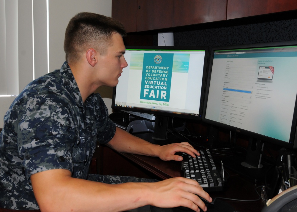 PENSACOLA, Fla. (Nov. 4, 2015) Information Systems Technician Seaman Austin Tresner explores how to register online for the DoD Virtual Education Fair. U.S. Navy photo by Carla M. McCarthy.