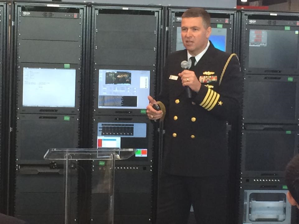 National Harbor, Md. (May 17, 2016) Oceanographer of the Navy Executive Assistant Capt. A.J. Reiss, Office of the Oceanographer of the Navy, outlines the Naval Oceanography Unmanned Systems Strategy to a packed house in the Navy Information Warfare Pavilion at Sea, Air and Space (SAS). SAS, sponsored by the U.S. Navy League, is the world's largest maritime exposition and provides a venue of interaction between the maritime defense industry and U.S and international military organizations.  U.S. Navy photo by Rick Naystatt/Released 


