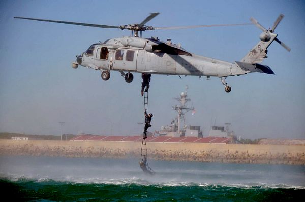 ROTA, Spain (March 4, 2016) Members of Explosive Ordnance Disposal Mobile Unit (EODMU) 8, practice techniques for fast roping, rappelling, and Special Purpose Insertion and Extraction at Naval Station Rota, Spain March 4, 2016. U.S. 6th Fleet, headquartered in Naples, Italy, conducts the full spectrum of joint and naval operations, often in concert with allied, joint, and interagency partners, in order to advance U.S. national interests and security and stability in Europe and Africa. U.S. Navy photo by Ensign Seth Wartak.