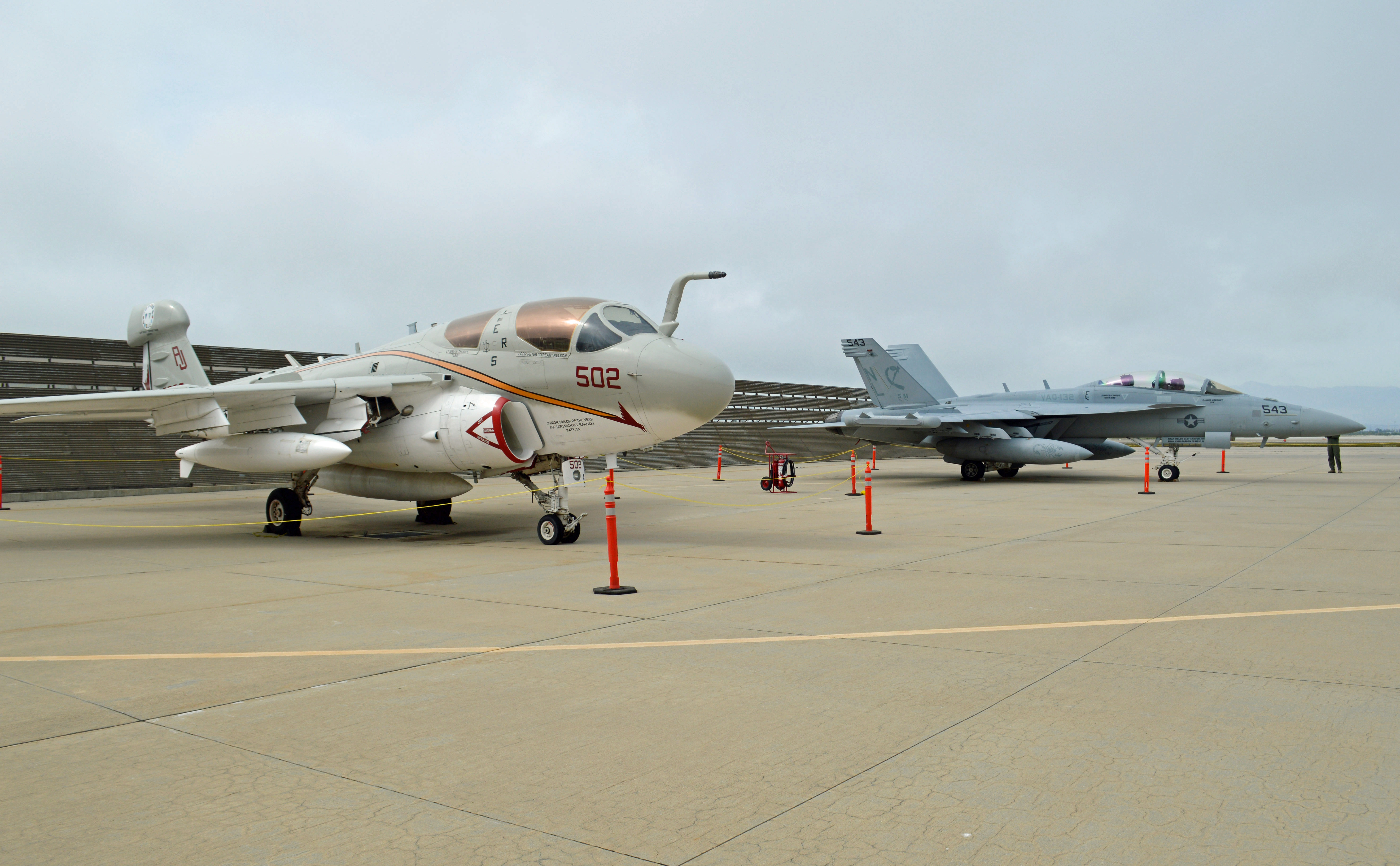 The last U.S. Navy EA-6B Prowler, front, and a U.S. Navy EA-18G Growler were on display representing past and present electronic warfare aircraft platforms at the 45th Annual Collaborative EW Symposium at Naval Base Ventura County, Point Mugu, California, on April 6. The symposium, jointly hosted by Naval Air Warfare Center Weapons Division and the Association of Old Crows, ran April 5-7. Photo courtesy of U.S. Navy.