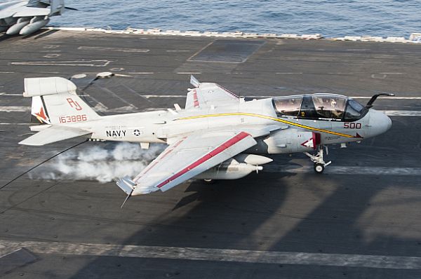 ARABIAN GULF (Oct. 17, 2014) An EA-6B Prowler assigned to the Garudas of Electronic Attack Squadron (VAQ) 134 lands on the flight deck of the aircraft carrier USS George H.W. Bush (CVN 77). George H.W. Bush is supporting maritime security operations, strike operations in Iraq and Syria as directed, and theater security cooperation efforts in the U.S. 5th Fleet area of responsibility. U.S. Navy photo by Mass Communication Specialist 3rd Class Brian Stephens.