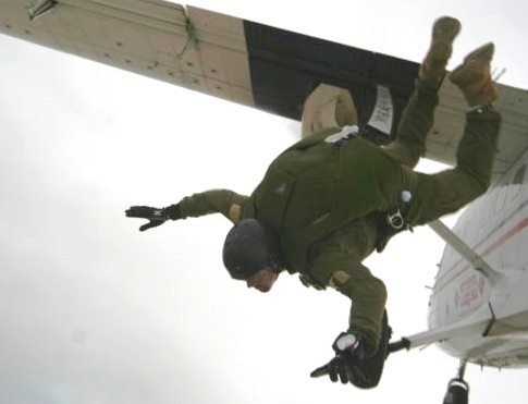 ELOY, Ariz. - Brenden McMullen jumps out of a civilian fixed wing aircraft while testing the next generation of Marine Corps personnel parachutes as a Navy Senior Chief assigned to the Marine Corps Systems Command Raids and Reconnaissance Test Branch in 2006. McMullen - now a Navy civilian engineer - was recently commended for his impact on new research to identify threats, risks, and vulnerabilities related to wearable and embeddable technologies. As the only Department of Defense civilian member of a Department of Homeland Security focus group, he used his military expertise to evaluate wearable items like fitness bands and medical telemetry - including LifeAlert and GoogleGlass - in addition to surgically implanted items. "This year's program would not have been a success without Brenden's active engagement and partnership," said a DHS official in a December 2014 letter to the Navy. Photo courtesy of U.S. Marine Corps.