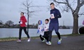 Family running outside in cold weather