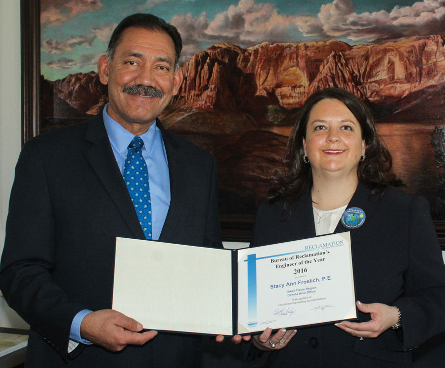 Commissioner Estevan López with Stacy Ann Froelich, P.E., Reclamation's Engineer of the Year.