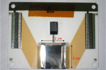 A detailed view of the diamond wafers scientists use to get a better measure of spinning electrons. | Photo courtesy of Jefferson Lab. 