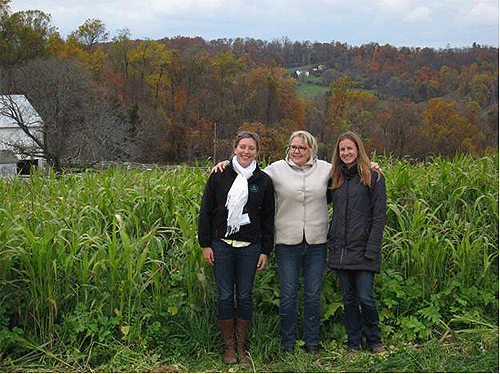 ORISE program participant Kate Pinkerton, Chief of the Rural Branch in EPA’s Office of Wastewater Management Allison Wiedeman, and ORISE program participant Erika Larsen stand in front of a cover crop research plot at Steve and Cheri Groff’s farm in Holtwood, PA. 