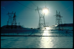 Electrical transmission lines cross a snow-covered field in Dallas Dam, Oregon. | Photo courtesy of the Energy Department