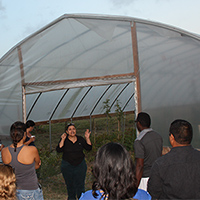 Diana Padilla talks about installing the seasonal high tunnel themselves and vegetables grown.