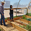 NRCS Agronomist and Stephanie Reyes discuss planting and the different plants.