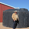 The ag water harvesting catchment system on Durham's ranch includes six 5,000 gallon storage tanks.