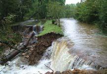 An image showing damage to the city water system of Asheville, NC due to heavy rains and flooding.