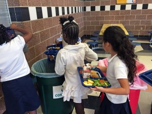 Elementary students learn about ways to reduce food waste, including composting