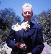 Theodore Payne with a Matilija Poppy