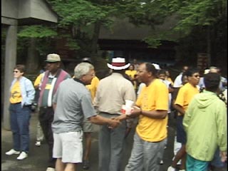 2 people shaking hands at a conservation workshop