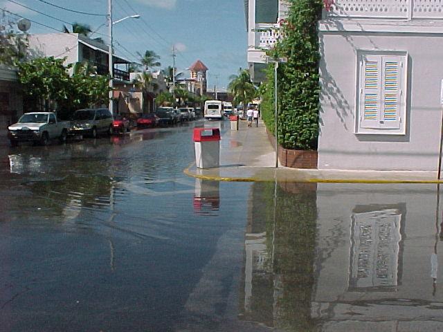 Photo of downtown intersection inundated with seawater